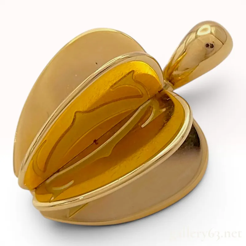 Cartier 18 Karat Yellow Gold Three-Dimensional Apple Pendant from auction in Atlanta, Georgia