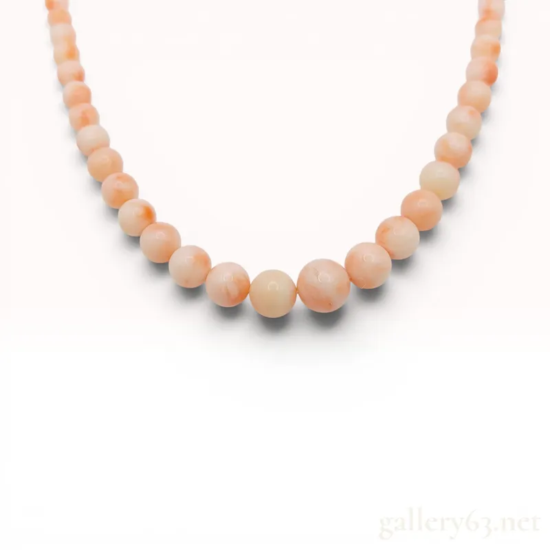 Graduated Antique Angel Skin Coral Bead Necklace with Filigree Clasp from auction in Atlanta, Georgia