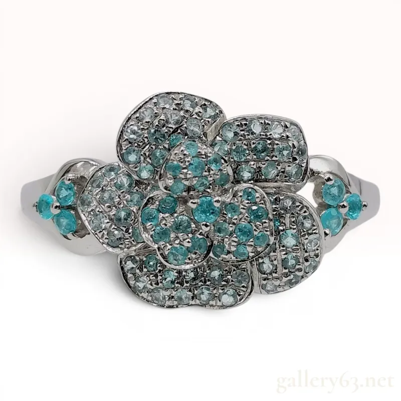 A Platinum and Paraiba Tourmaline Flower Cluster Ring from auction in Atlanta, Georgia