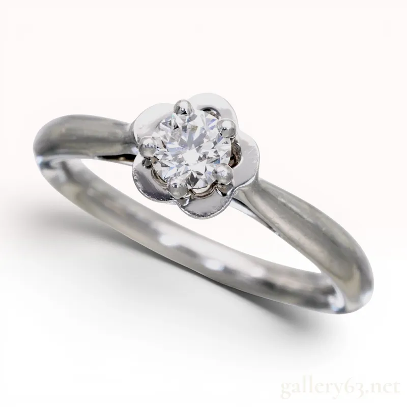 Chanel Camelia Platinum and D-VVS1-EX Diamond Solitaire Ring W/GIA Report from auction in Atlanta, Georgia