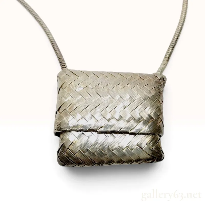 Vintage Tiffany & Co. Pill Case Necklace in Woven Sterling Silver from auction in Atlanta, Georgia