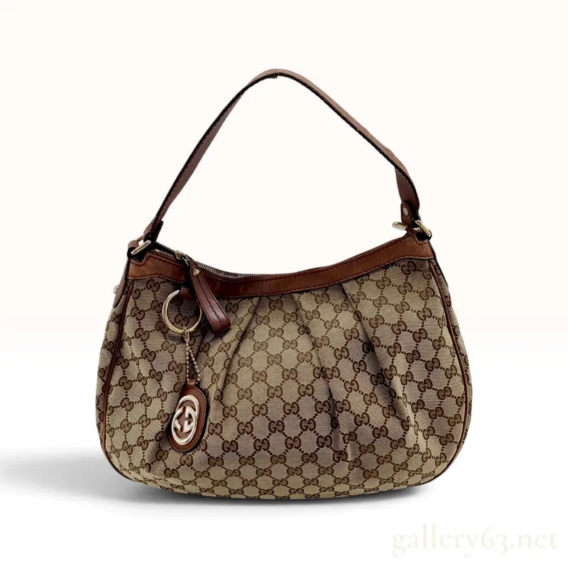 Gucci Sukey Hobo Beige and Ebony GG Canvas Medium Shoulder Bag from auction in Atlanta, Georgia