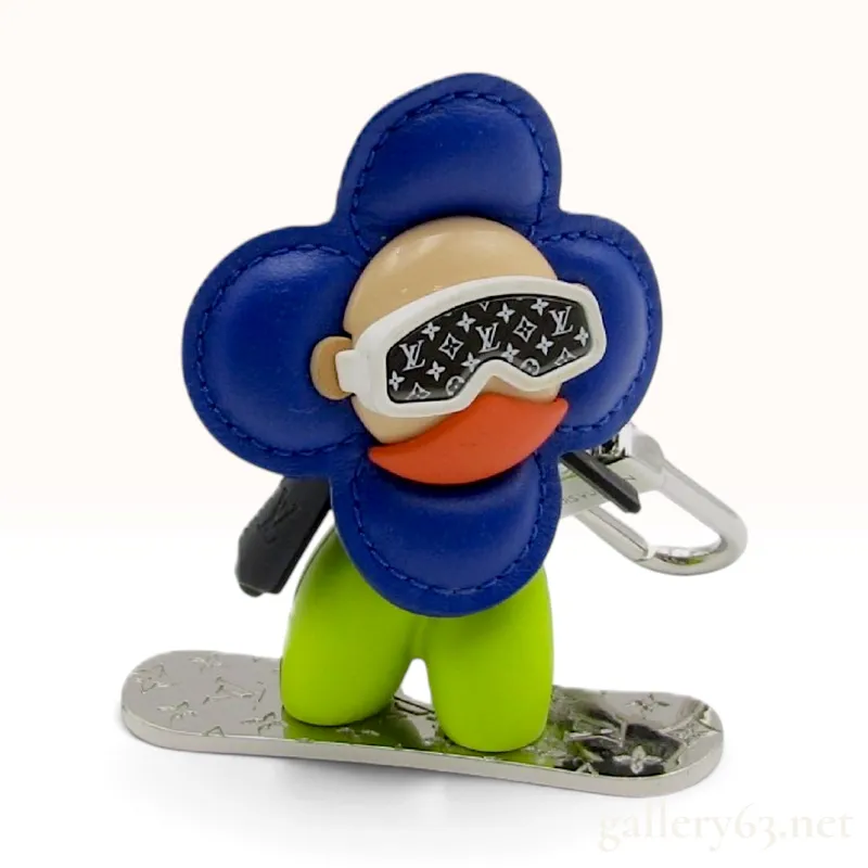 Louis Vuitton Vivienne Snowboarder Blue Leather and Resin Bag Charm Key Ring from auction in Atlanta, Georgia