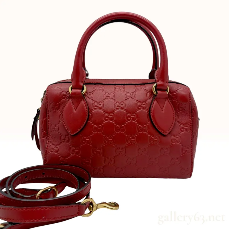 Gucci Microguccissima Mini Boston Bag Red Leather from auction in Atlanta, Georgia