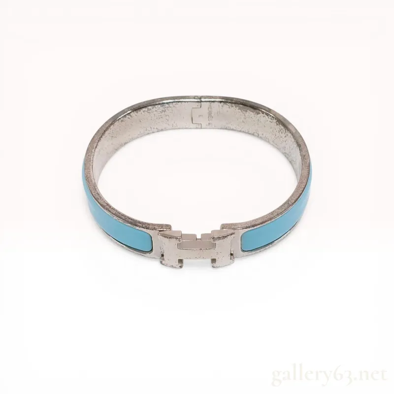 Hermes Clic H Enamel Bangle Bracelet from auction in Atlanta, Georgia