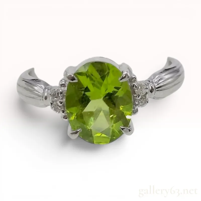 Peridot and Diamond Platinum Cocktail Ring from auction in Atlanta, Georgia