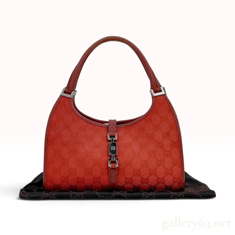 Gucci Red GG Canvas Jackie O Piston Lock Shoulder Bag from auction in Atlanta, Georgia