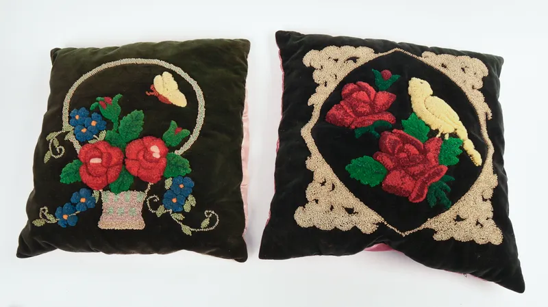 TWO 19TH CENTURY STUMPWORK PILLOWS. from auction in Freeport, Maine