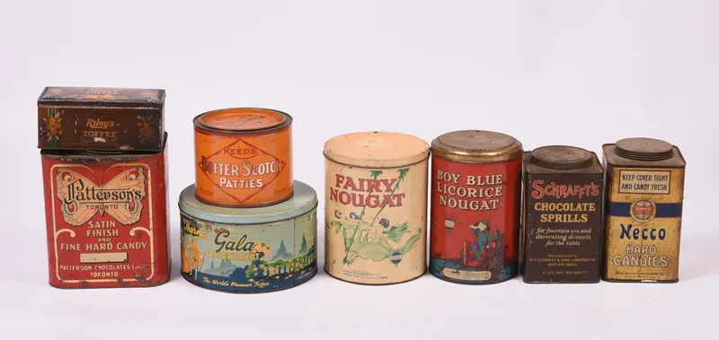 Eight Vintage Confectionary Tins. from auction in Freeport, Maine