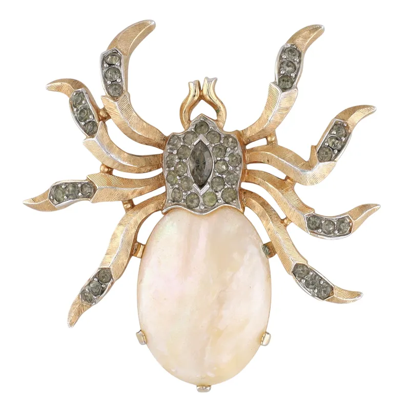 Trifari Gold Tone Mother Of Pearl Rhinestone Spider Brooch from auction in Ravenna, Ohio