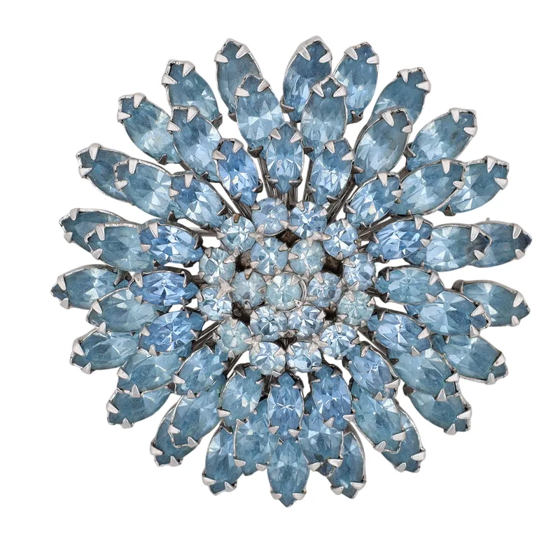 Weiss Vintage Silver Tone Rhinestone Starburst Brooch from auction in Ravenna, Ohio