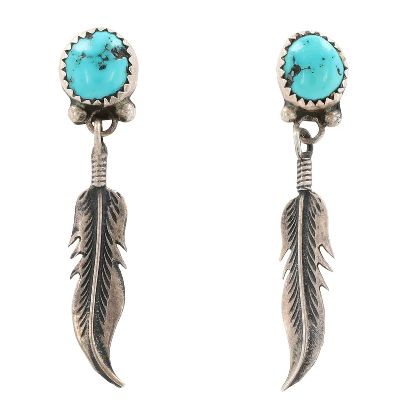 Navajo Sterling Turquoise Feather Dangle Earrings from auction in Ravenna, Ohio