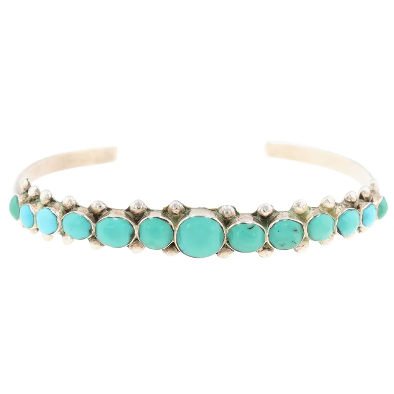 Erma Esalalio Zuni Sterling Turquoise Cuff Bracelet from auction in Ravenna, Ohio