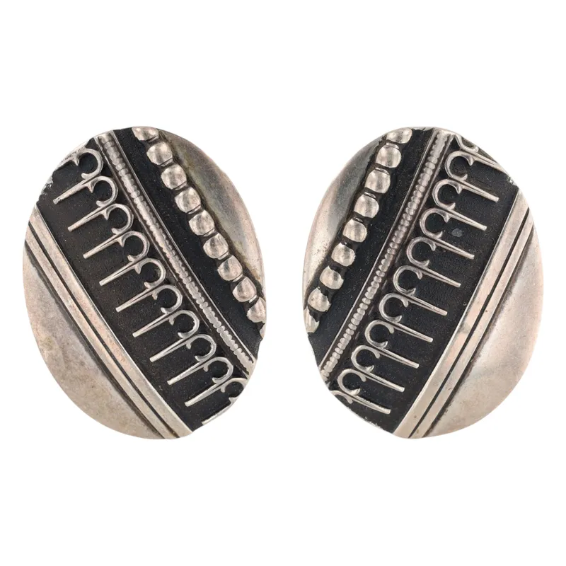 David Sloane Navajo Sterling Textured Overlay Earrings from auction in Ravenna, Ohio