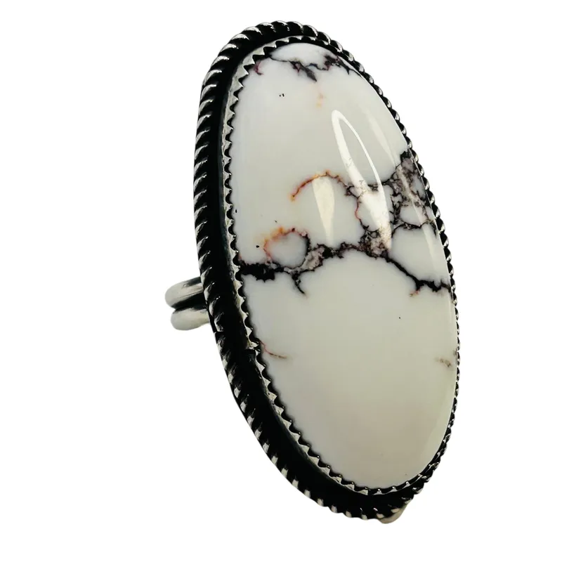 Tia Long Navajo Sterling Buffalo Turquoise Adjustable Ring from auction in Ravenna, Ohio