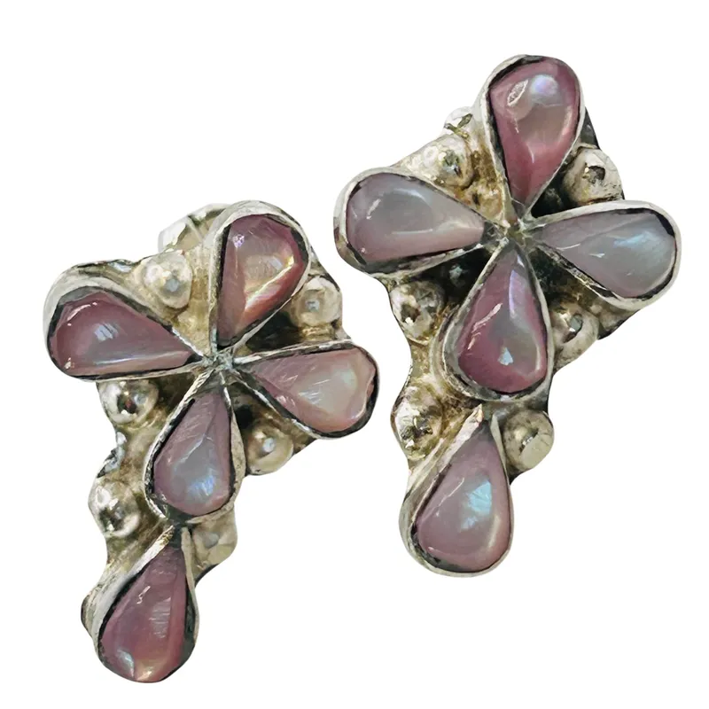Pino Yunie Zuni Sterling Pink Shell Cross Earrings from auction in Ravenna, Ohio