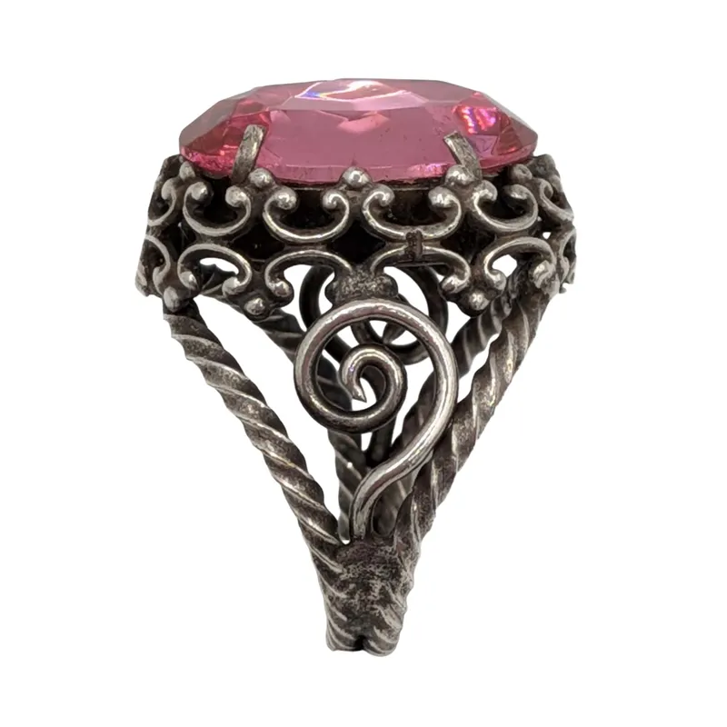 Sterling Silver Pink Rhinestone Open Work Adjustable Ring from auction in Ravenna, Ohio