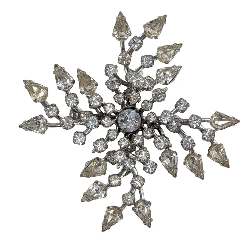 Kramer Silver Tone Rhinestone Starburst Brooch from auction in Ravenna, Ohio