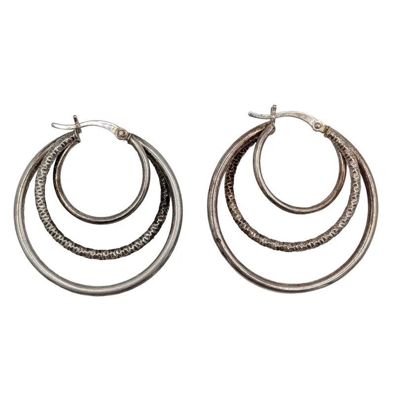 Signed Sterling Silver Textured Hoop Earrings from auction in Ravenna, Ohio