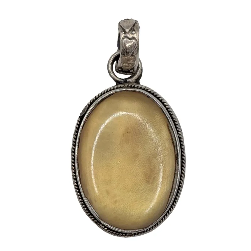 Sterling Silver Butterscotch Amber Pendant from auction in Ravenna, Ohio