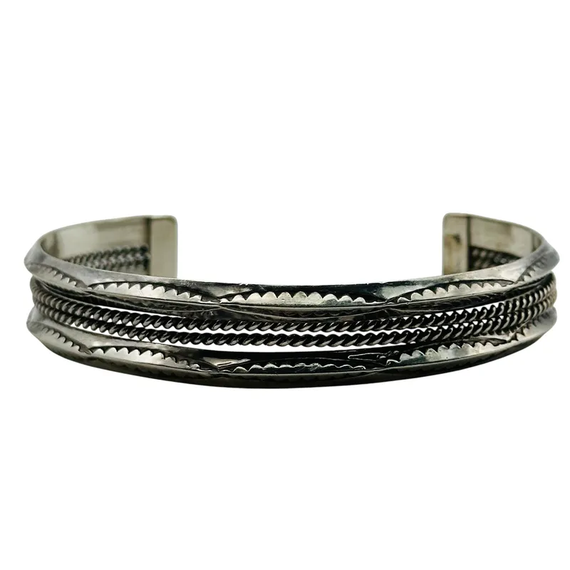 Navajo Sterling Stamped Cuff Bracelet from auction in Ravenna, Ohio