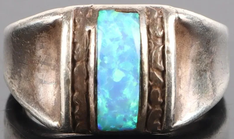 VINTAGE STERLING SILVER BLUE OPAL UNISEX RING from auction in Tallahassee, Florida