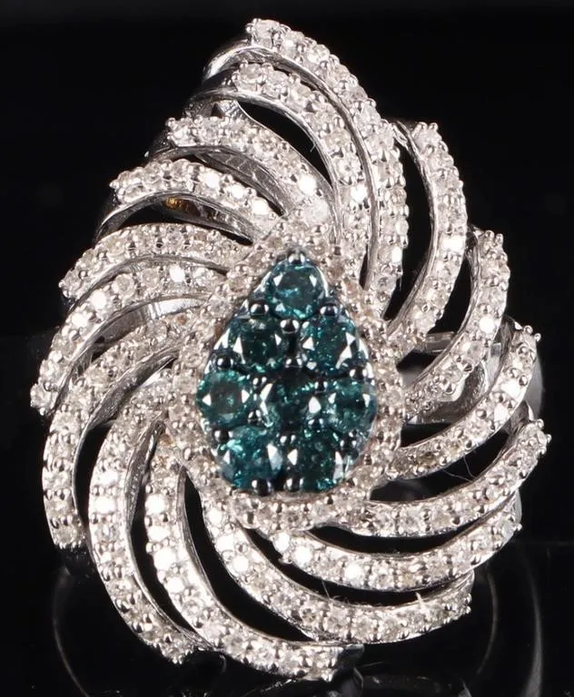 STERLING SILVER BLUE & WHITE DIAMOND LADIES RING from auction in Tallahassee, Florida