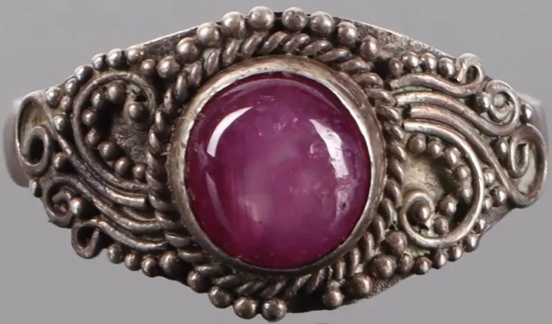 STERLING SILVER LADIES RING W/ RUTILATED RUBY GEM from auction in Tallahassee, Florida