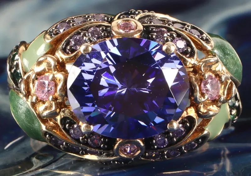 STERLING SILVER TOPAZ LADIES ENAMEL RING from auction in Tallahassee, Florida