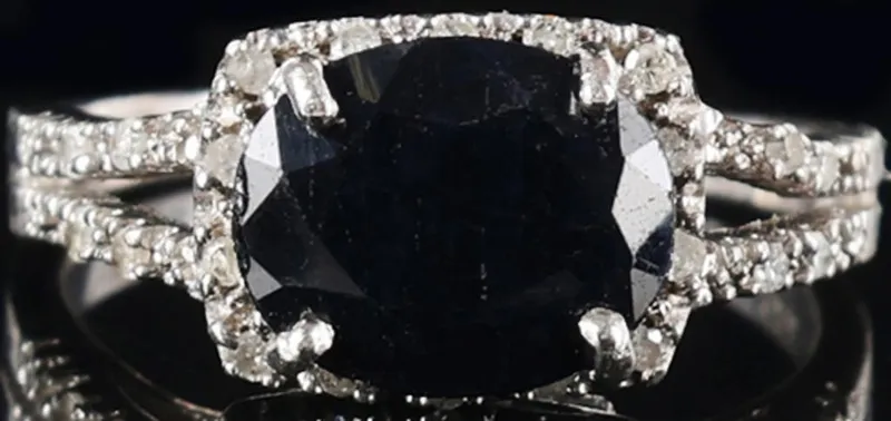 STERLING SILVER LADIES RING W/ 2CT SAPPHIRE & DIAS from auction in Tallahassee, Florida