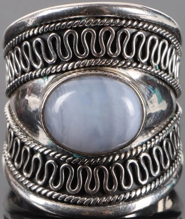 STERLING SILVER WHITE AGATE FILIGREE LADIES RING from auction in Tallahassee, Florida