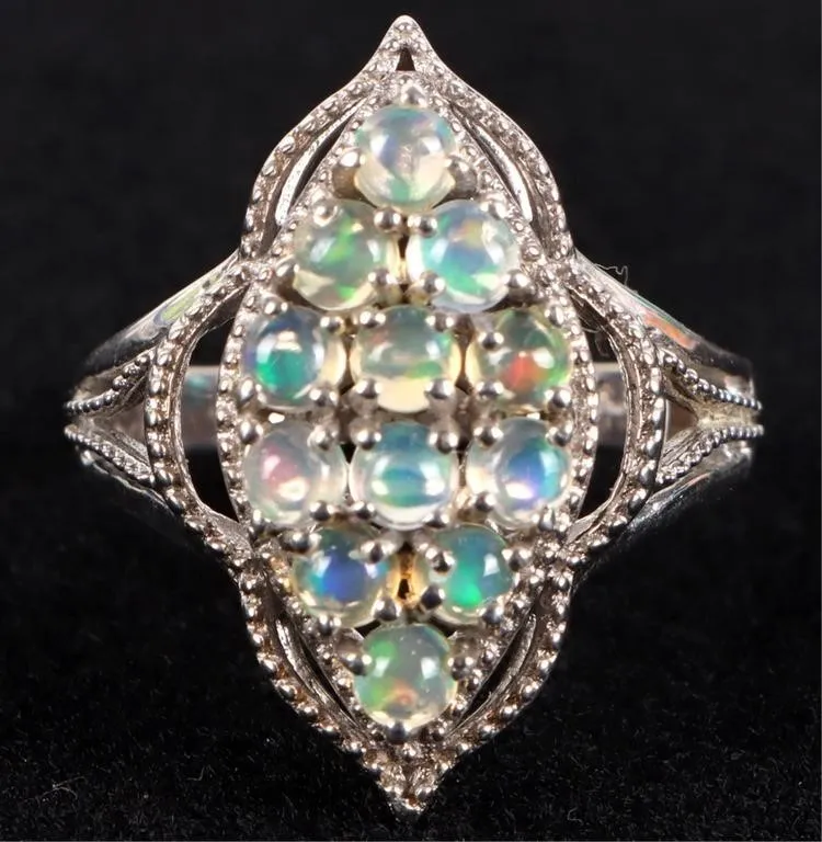 ORNATE OPAL STERLING SILVER LADIES RING from auction in Tallahassee, Florida