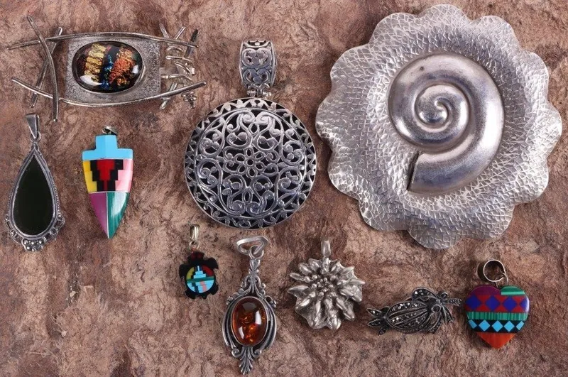 SW STYLE STERLING SILVER LADIES PENDANTS (10) from auction in Tallahassee, Florida