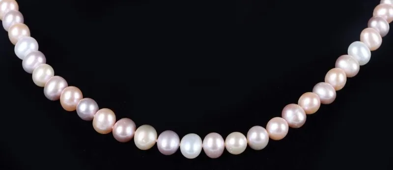 WHITE & PINK PEARL NECKLACE W/ STERLING CLASP from auction in Tallahassee, Florida