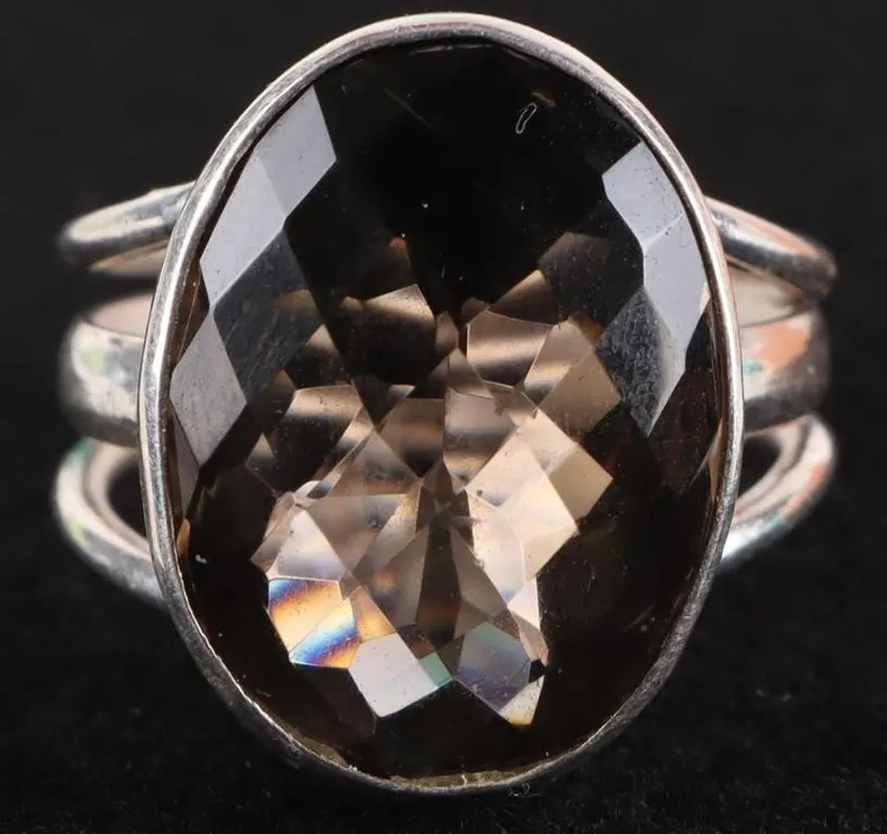 STERLING SILVER BROWN GLASS LADIES RING from auction in Tallahassee, Florida