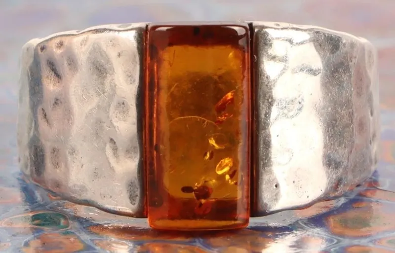 STERLING SILVER AMBER LADIES RING from auction in Tallahassee, Florida