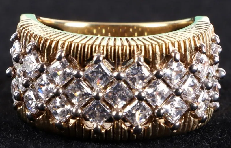 GOLD-TONED STERLING SILVER CUBIC ZIRCONIUM RING from auction in Tallahassee, Florida