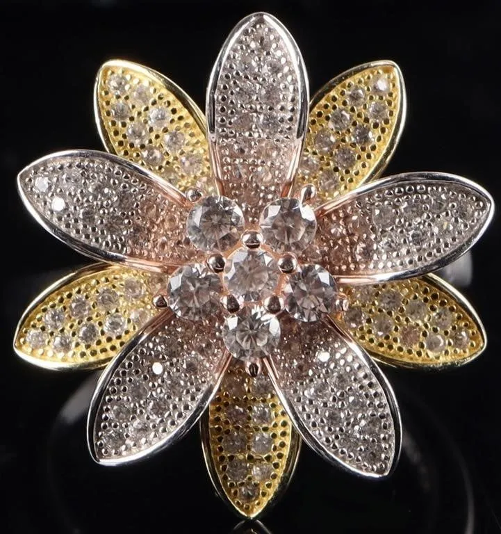 STERLING SILVER PINK SPINEL FLOWER LADIES RING from auction in Tallahassee, Florida