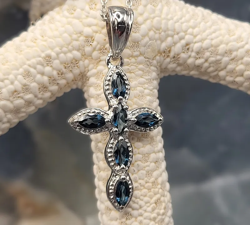 1.02 CT London Blue Topaz .925 Cross Necklace from auction in Vero Beach, Florida