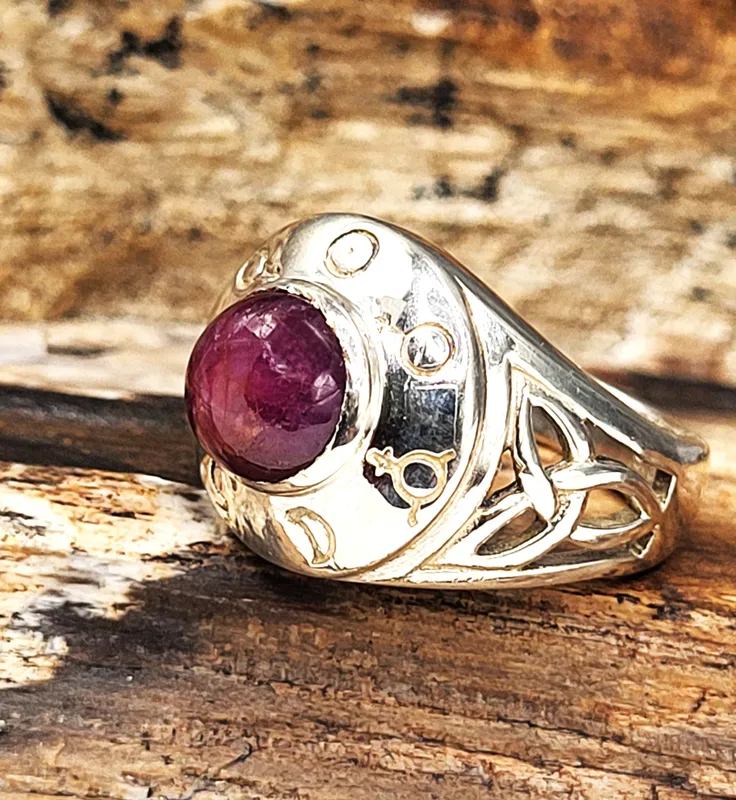 Celtic-Style Ruby Cabochon Sterling Silver Ring from auction in Vero Beach, Florida
