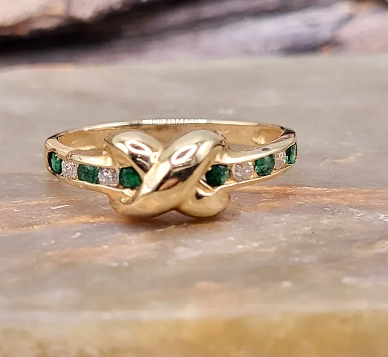 Emerald and Diamond X Hugs & Love Ring 14K from auction in Vero Beach, Florida