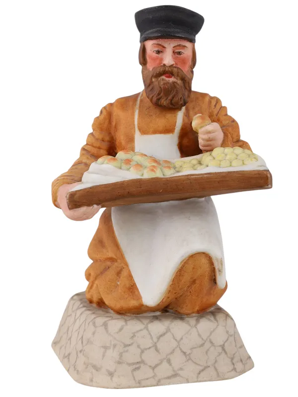 A RUSSIAN PORCELAIN FIGURE OF A FOOD VENDOR
BY THE GARDNER PORCELAIN FACTORY, VERBILKI, LATE 19TH CENTURY from auction in New York, New York