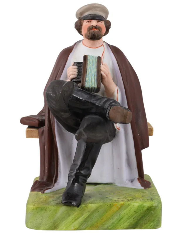 A RUSSIAN GARDNER PORCELAIN FIGURE OF AN ACCORDION PLAYER from auction in New York, New York