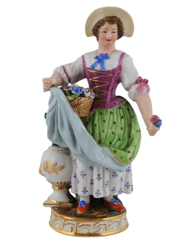 A RUSSIAN POPOV PORCELAIN FIGURE OF A WOMAN WITH FLOWERS from auction in New York, New York