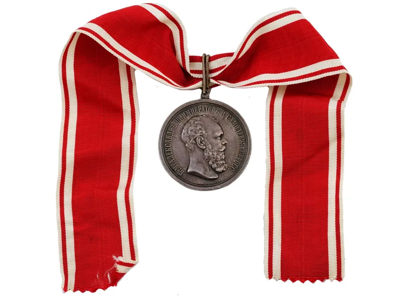 A RUSSIAN NECK SILVER MEDAL FOR ZEAL WITH RIBBON, ALEXANDER III from auction in New York, New York