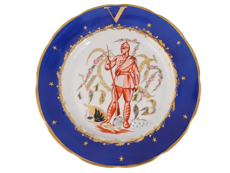 A RUSSIAN PORCELAIN PROPAGANDA PLATE "FIFTH ANNIVERSARY OF THE RED ARMY" from auction in New York, New York
