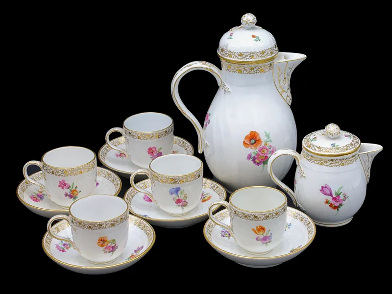A KPM BERLIN HAND-PAINTED PORCELAIN COFFEE SERVICE from auction in New York, New York