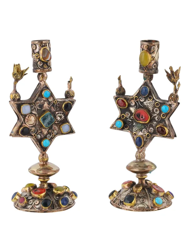 A PAIR OF VINTAGE JUDAICA SHABBAT CANDLE HOLDERS, TURKMEN MANUFACTURE from auction in New York, New York