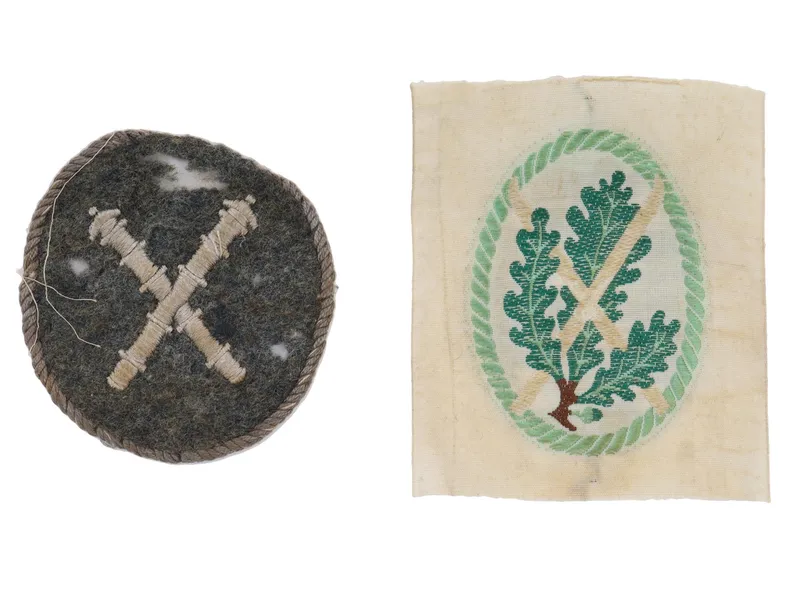 A PAIR OF WWII GERMAN WEHRMACHT CLOTH PATCHES from auction in New York, New York
