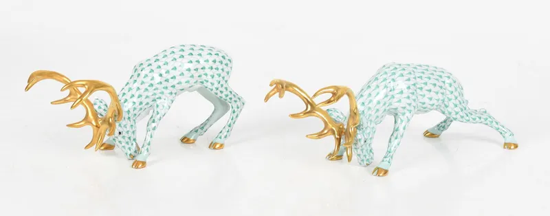 Two Hand-Painted and Parcel-Gilt Herend Porcelain Green Fishnet Stags, Late 20th Century from auction in Pineville, Pennsylvania